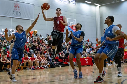 Image of students playing basketball